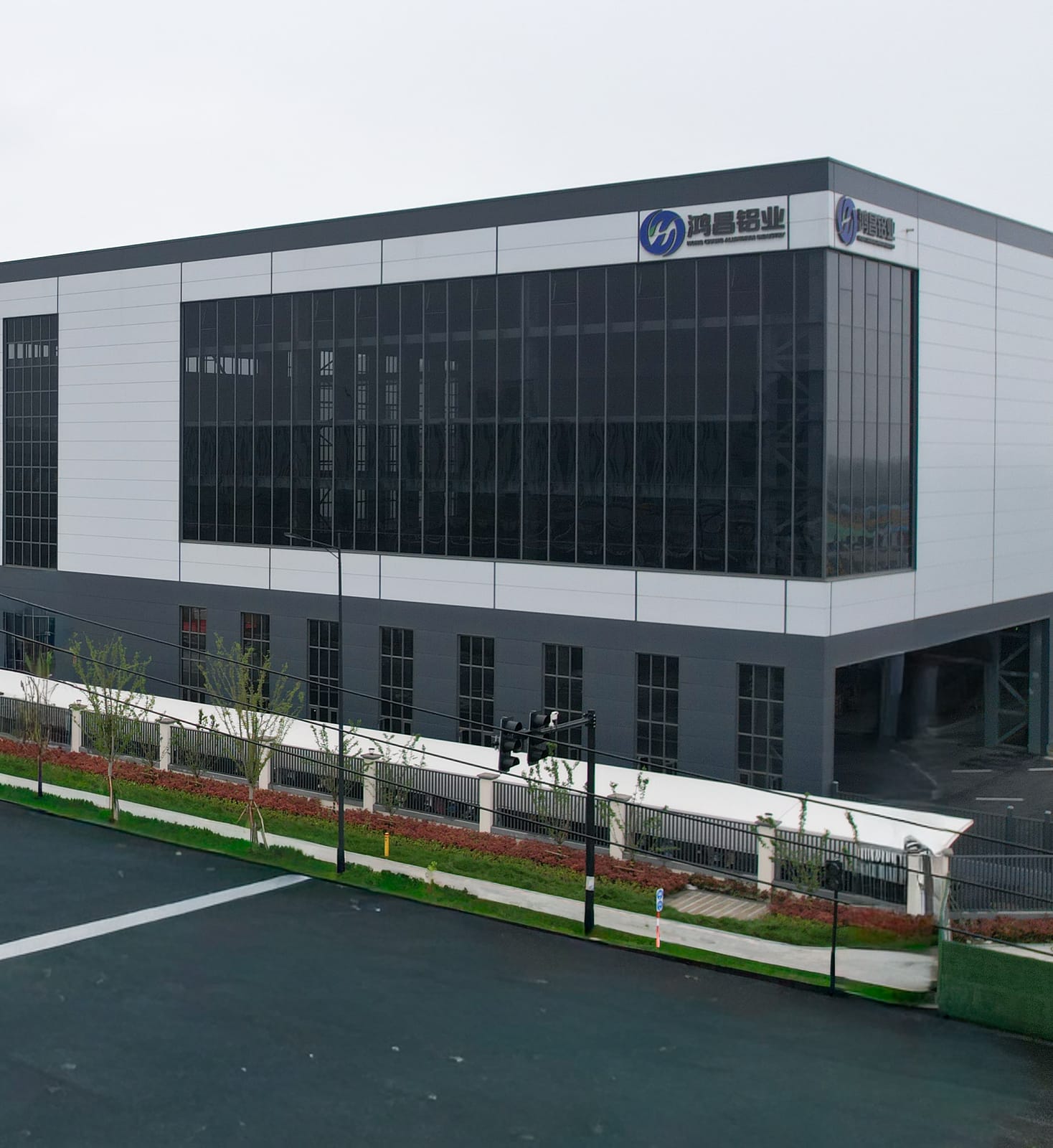 Large commercial aluminium facade at parent factory building